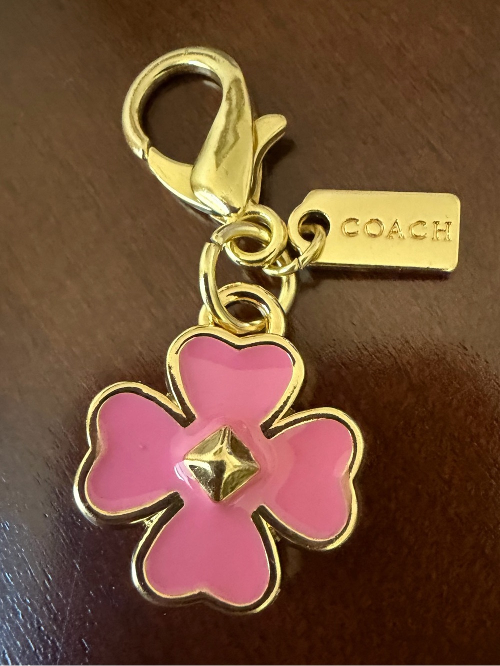 COACH Pink Enamel Flower Charm Keychain with Gold-Tone Hardware